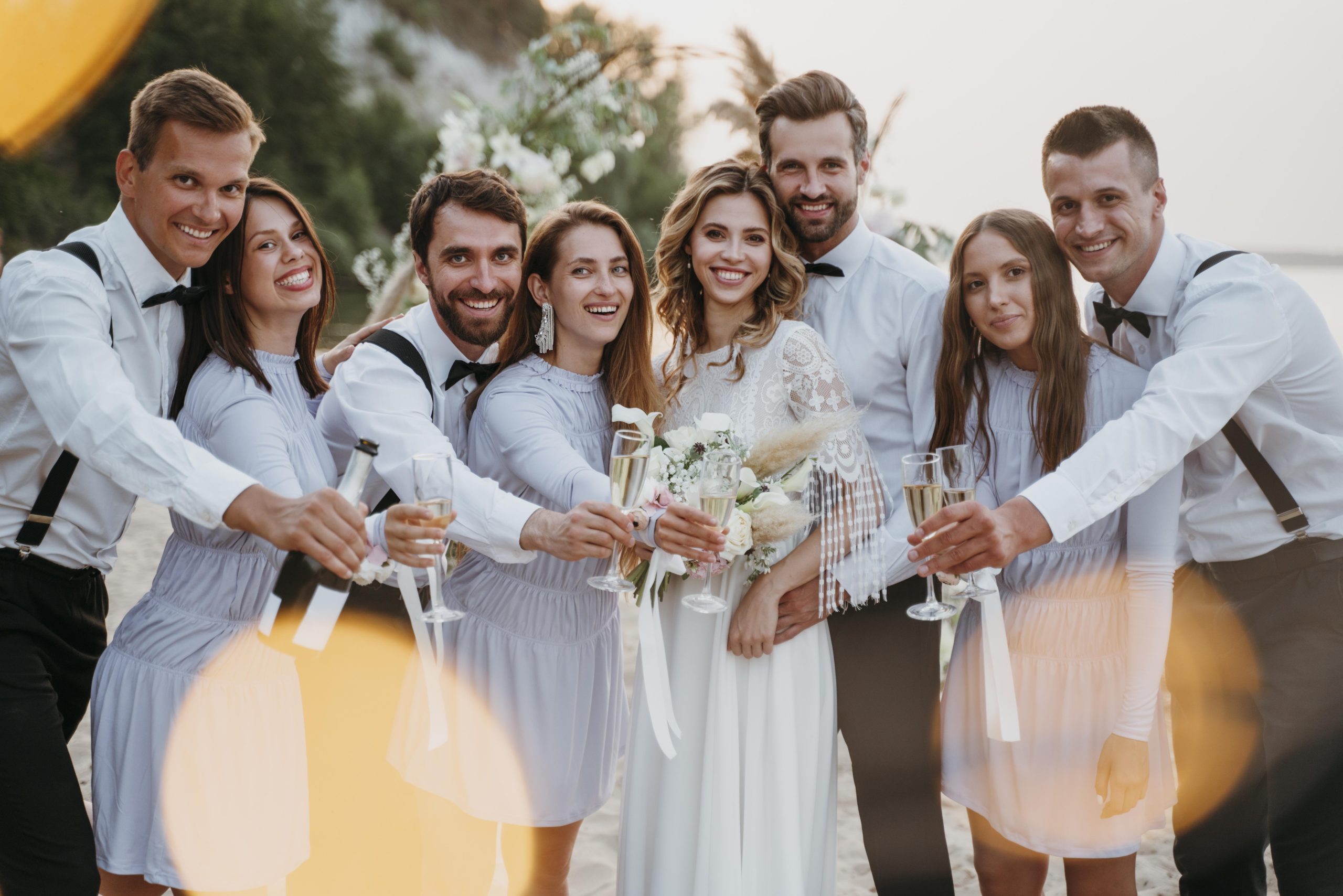 bride-groom-having-their-wedding-with-guests-beach